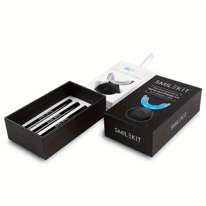 SMILE-KIT Wireless Teeth Whitening Kit with LED light, whitening gel pens, and shade guide.