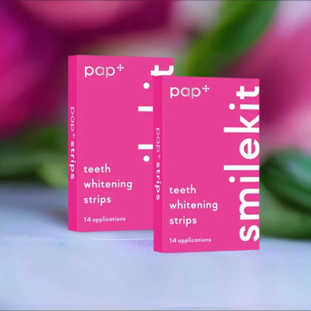 PAP+ Whitening Strips packaging with 14 applications shown.