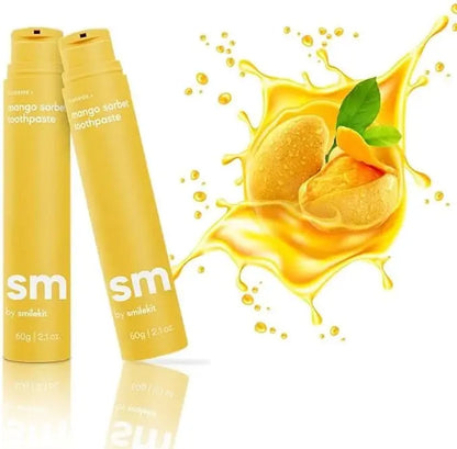 Toothpaste tubes with mango sorbet flavor and splash background.