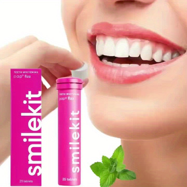 Teeth Whitening Pap+ Fizz set with Smilekit packaging and mint leaves, showcasing a bright smile.