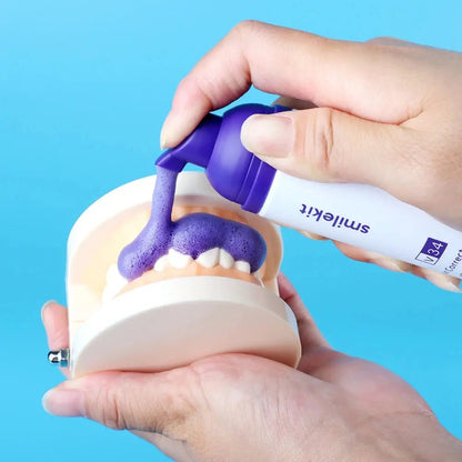 V34 Color Corrector Foam being applied to dental model.