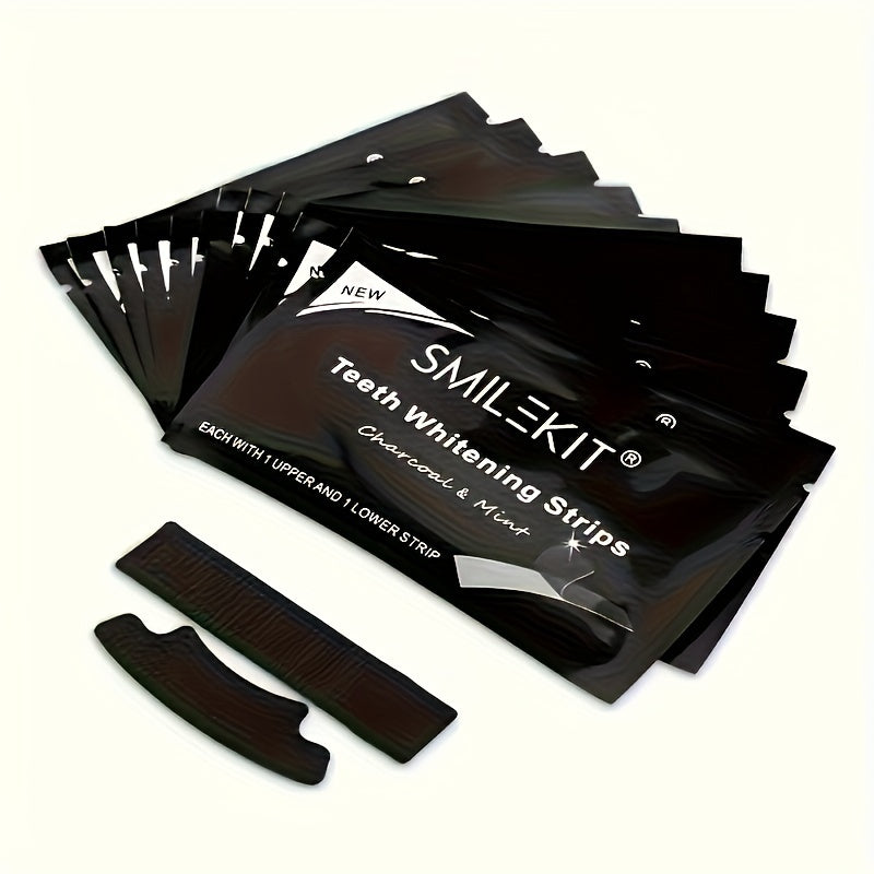 Bamboo Charcoal Teeth Whitening Strips laid out with packaging, designed to brighten and whiten teeth naturally.